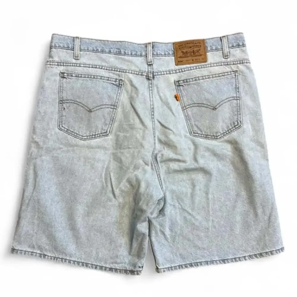 Vintage Levi's 550 Relaxed Fit Denim Jorts Light Wash Orange Tab